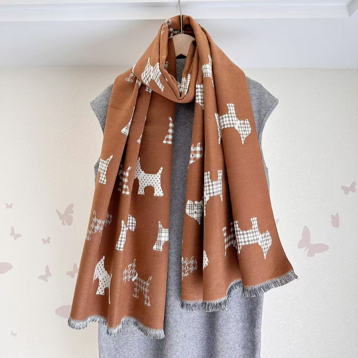 Camel jacquard blanket scarf with white dog prints and gray fringe