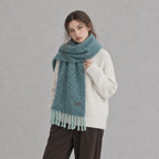 Chunky boucle knit scarf for women, turquoise boucle knit with long fringe tassels, close view
