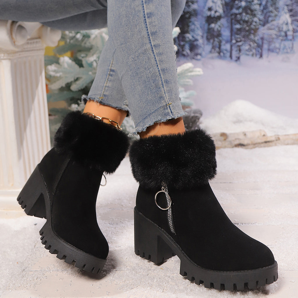 Black ankle booties with faux fur cuff, side zip, chunky heel, lug sole