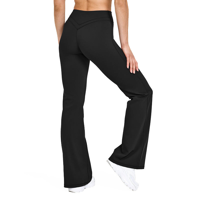 Women’s high-waisted crossover flare leggings in black, wide bootcut pant legs