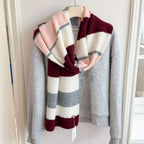 Women’s long striped wool scarf with wide knit stripes in burgundy, cream, and pale pink.