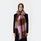 Plaid scarf with large blocks of mauve, brown, and deep pink; long fringe ends