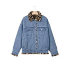 Light blue denim jacket on hanger with leopard-print fleece collar and button-up front