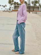 Light purple cropped open-knit button cardigan with long sleeves, ribbed hem, side view