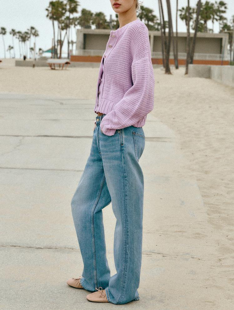 Light purple cropped open-knit button cardigan with long sleeves, ribbed hem, side view