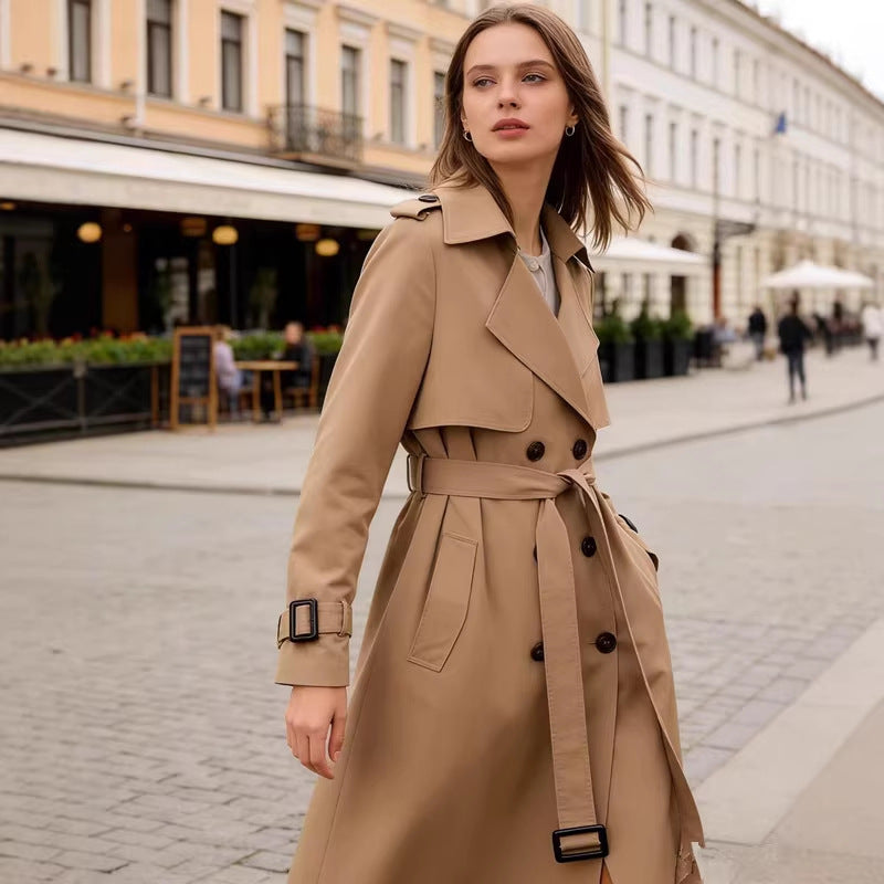 Khaki belted trench coat with double-breasted buttons and shoulder storm flap