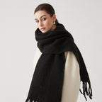 Oversized fuzzy wool-blend scarf in black, fringe ends with draped neck wrap