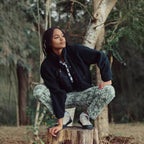 Women’s sherpa jacket in dark navy/black with snap front and stand collar