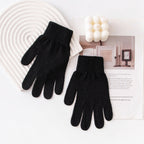 Black knit winter gloves with ribbed cuffs and five-finger design