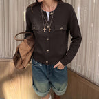 Dark brown knit cardigan with gold buttons and flap pockets, crew neck, ribbed cuffs