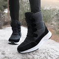 Women's fleece-lined snow boots, black high-top with hook-and-loop straps and white sole