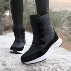 Women's fleece-lined snow boots, black high-top with hook-and-loop straps and white sole