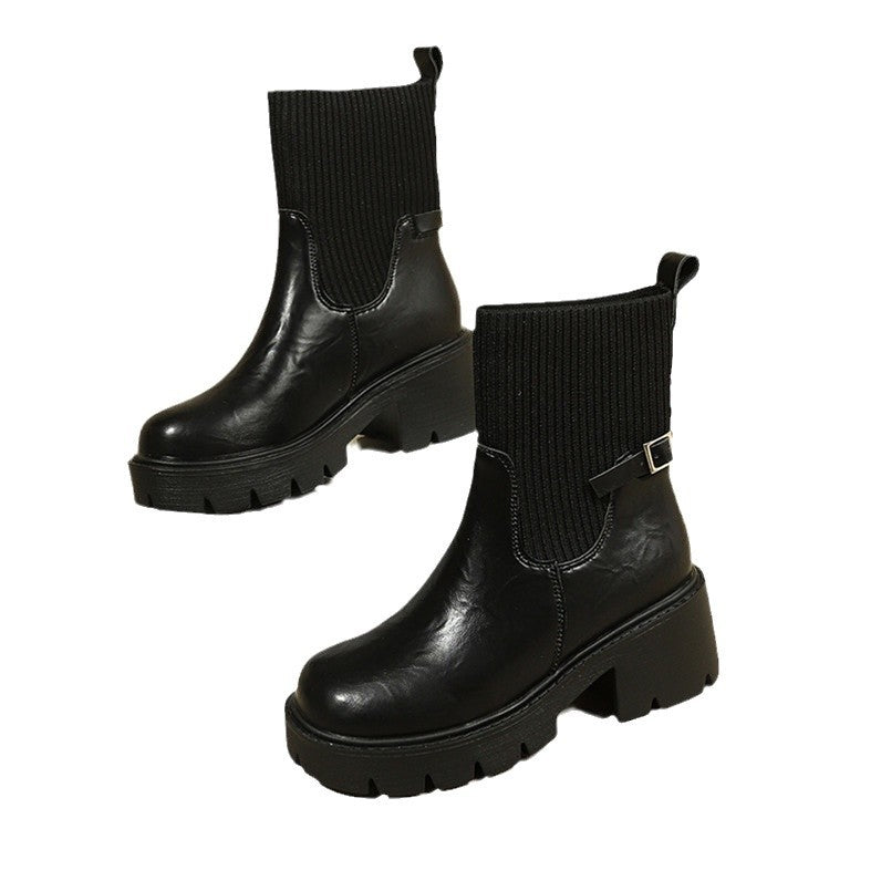 Black Chelsea sock boots with ribbed cuffs and chunky lug sole