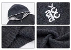 Gray hooded cardigan close-ups: plaid hood lining, chest emblem, knit texture