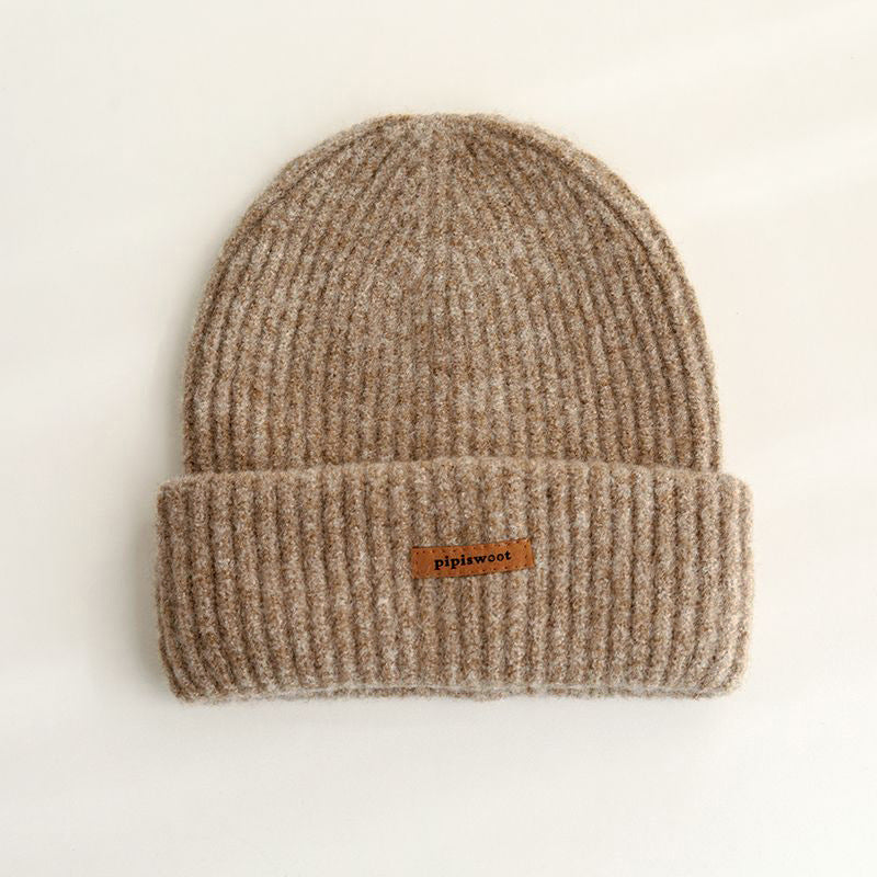 Camel ribbed knit beanie with wide cuff and woven "pipiswoot" label