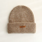 Camel ribbed knit beanie with wide cuff and woven "pipiswoot" label