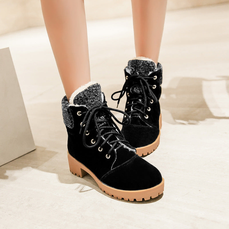 Black lace-up ankle boots with sherpa cuffs and lug soles