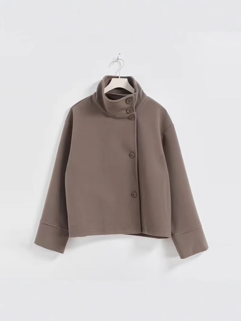 Cropped stand-collar wool jacket in taupe with button front and long sleeves on hanger
