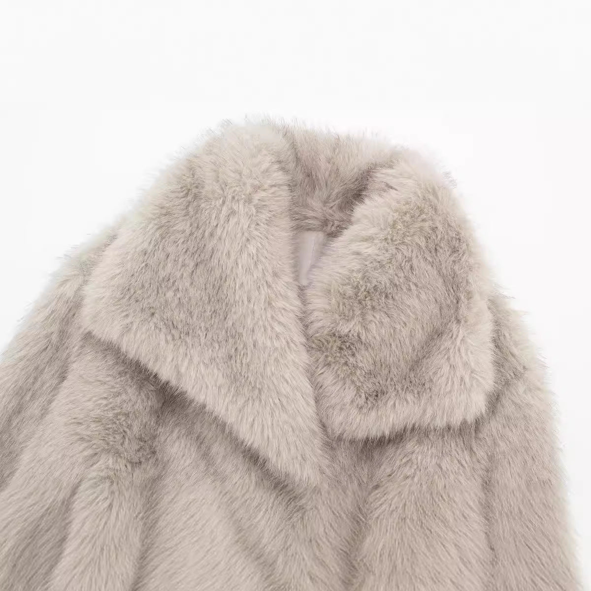 Light gray cropped faux fur jacket with oversized fold-over collar detail.