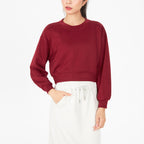 Red cropped crewneck sweatshirt with relaxed fit and ribbed cuffs