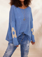 Blue oversized knit flower sweater with drop shoulders and metallic motifs