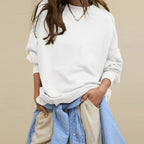 Oversized crewneck sweatshirt in white with exposed seams and side-slit hem
