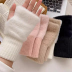 Plush fingerless gloves in white, pink, khaki and black with ribbed cuffs