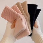 Fuzzy fingerless gloves in pink, khaki, black and white with ribbed cuffs