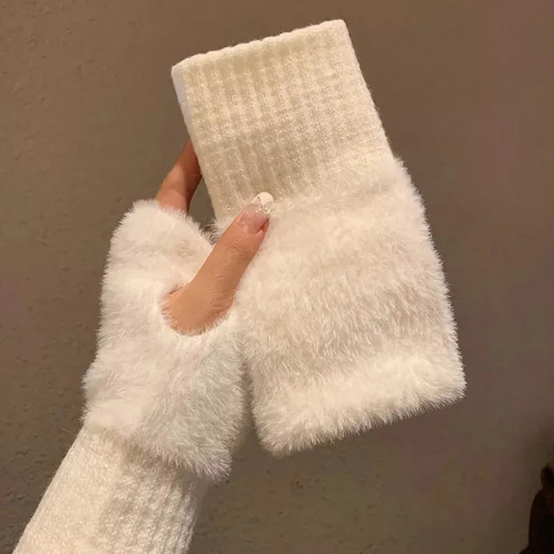White fuzzy fingerless gloves with plush cuffs and long ribbed wrists