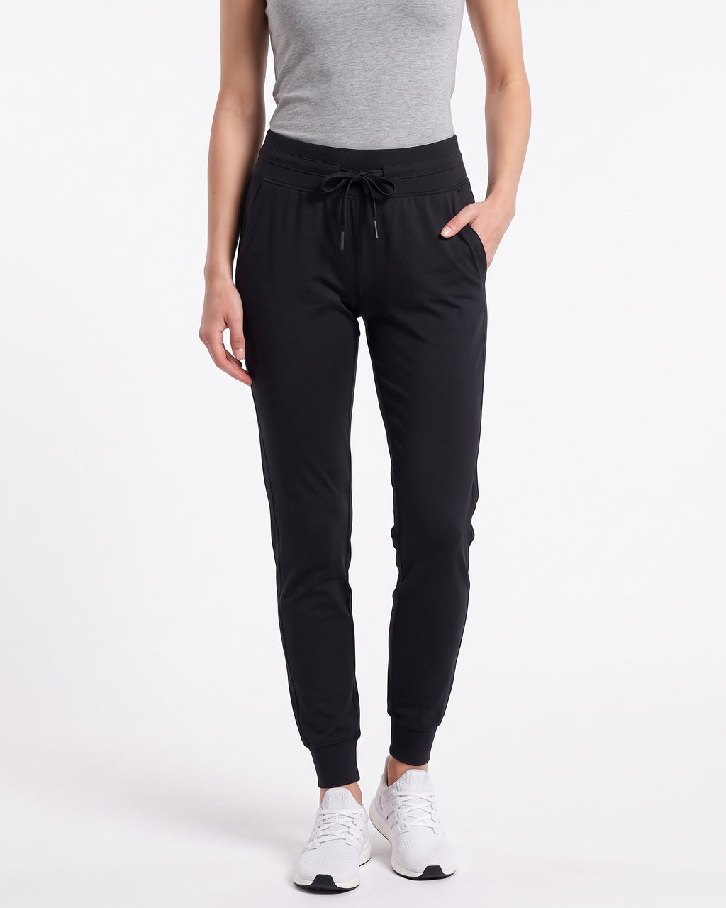 Women’s black slim-fit performance jogger pants with drawstring waist and ankle cuffs