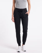 Women’s black slim-fit performance jogger pants with drawstring waist and ankle cuffs