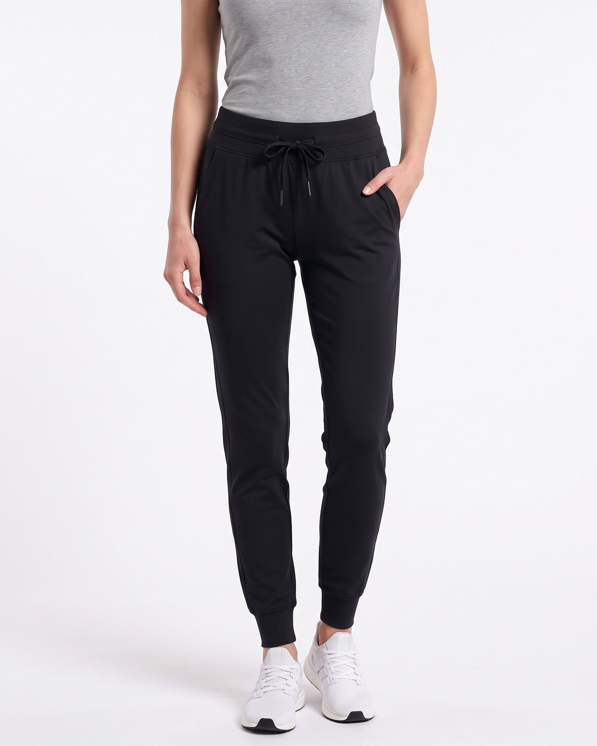 Women’s black slim-fit performance jogger pants with drawstring waist and ankle cuffs