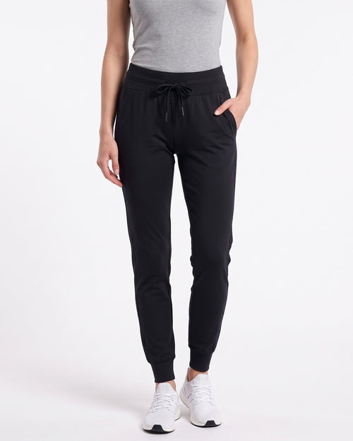Women’s black slim-fit performance jogger pants with drawstring waist and ankle cuffs