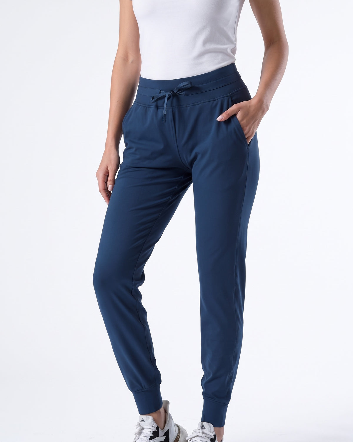 Women’s blue slim-fit performance jogger pants with drawstring waist and ankle cuffs
