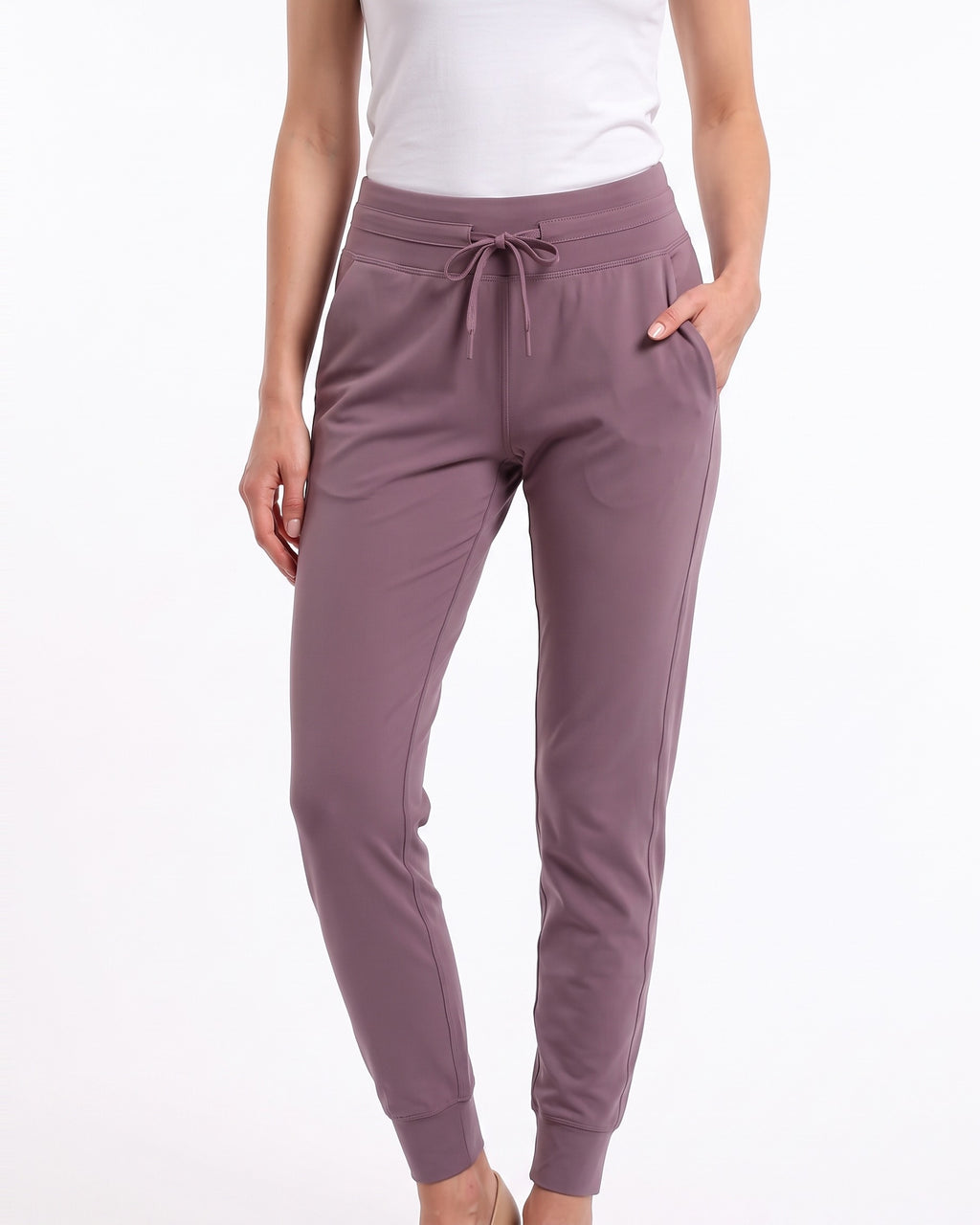 Women’s mauve slim-fit performance jogger pants with drawstring waist and ankle cuffs