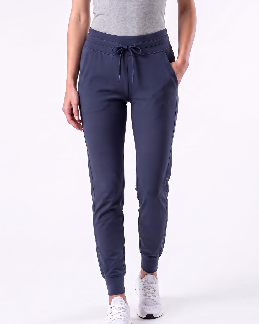 Women’s navy slim-fit performance jogger pants with drawstring waist and ankle cuffs