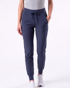 Women’s navy slim-fit performance jogger pants with drawstring waist and ankle cuffs