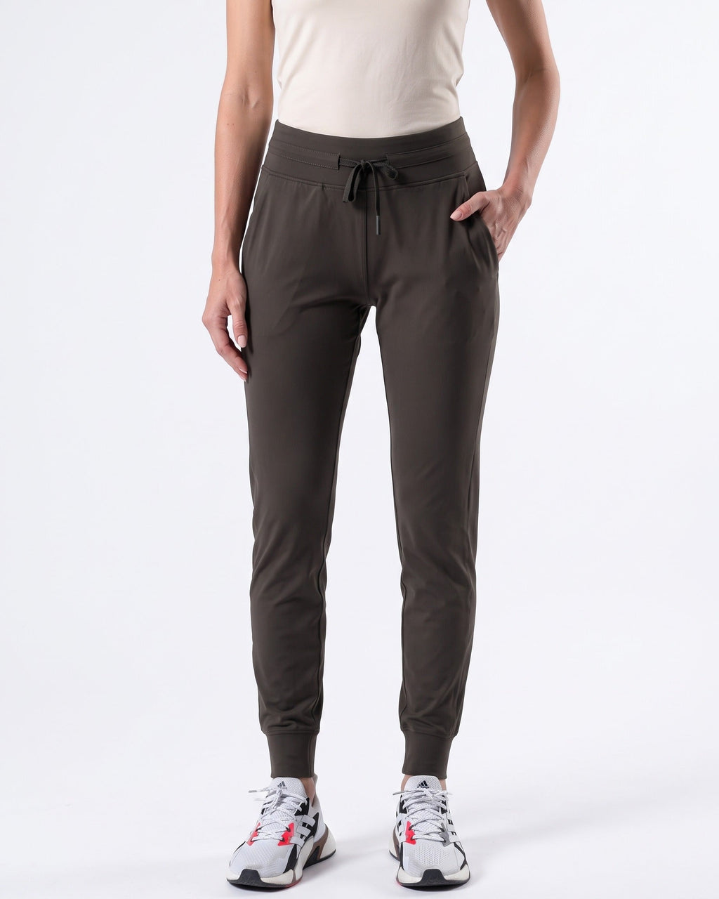 Women's olive slim-fit performance jogger pants with pockets and drawstring waist
