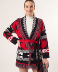 Women’s Aztec knit cardigan with red, black, and white fringe tassels and tie belt