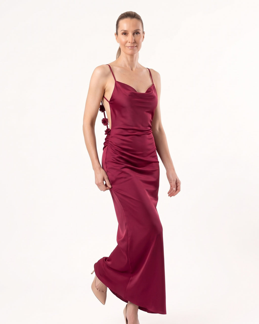 Burgundy satin maxi dress with thin straps and cowl neckline, gathered slip skirt.