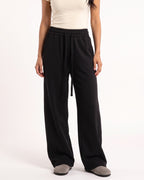 Women's black wide-leg sweatpants with drawstring waist and cuffed hem