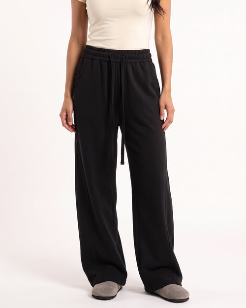 Women's black wide-leg sweatpants with drawstring waist and cuffed hem