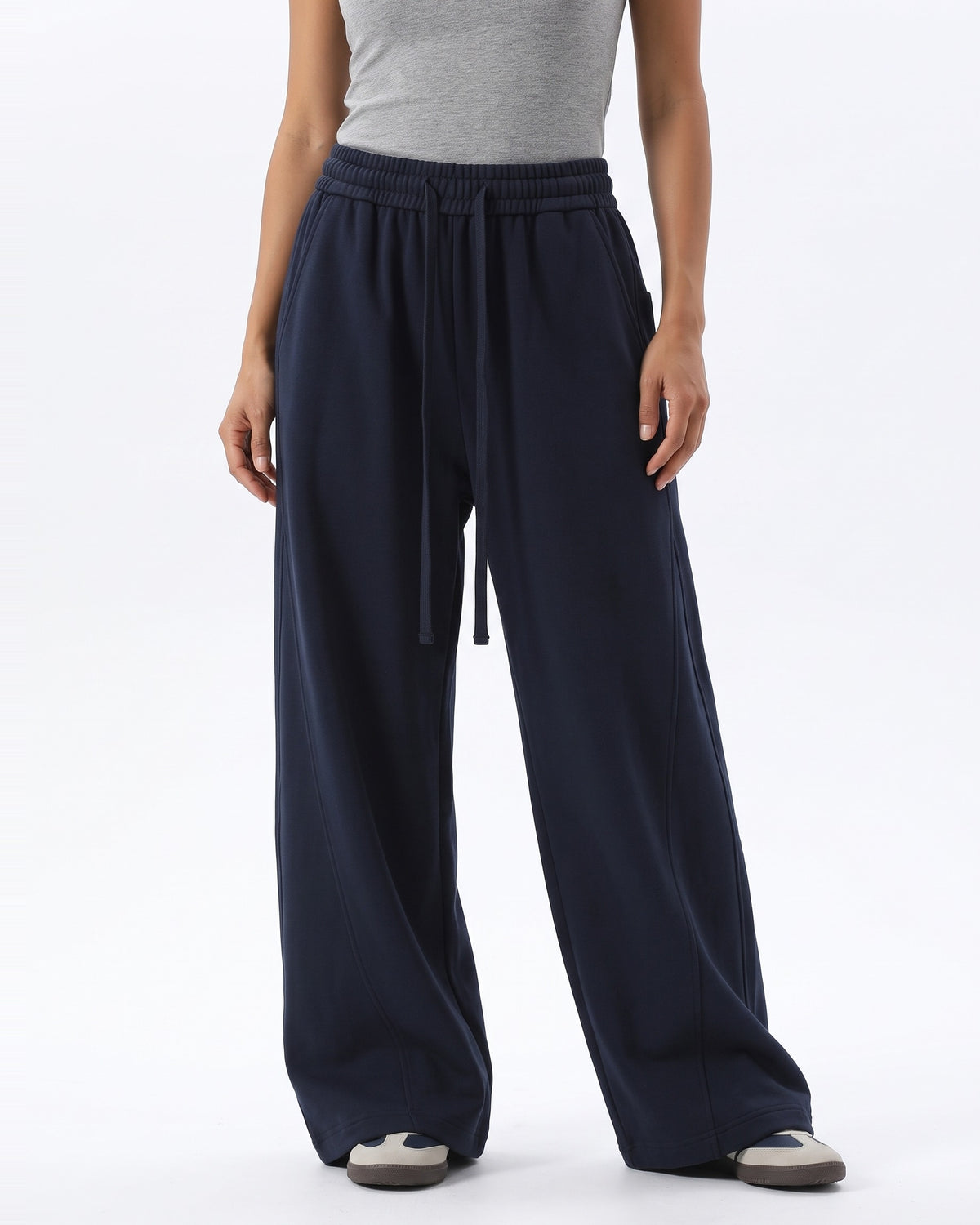 Women's navy wide-leg sweatpants with elastic waistband and drawstring ties