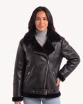 Women’s belted faux shearling aviator jacket worn, front zip and zip pocket details