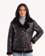 Women’s belted faux shearling aviator jacket worn, front zip and zip pocket details