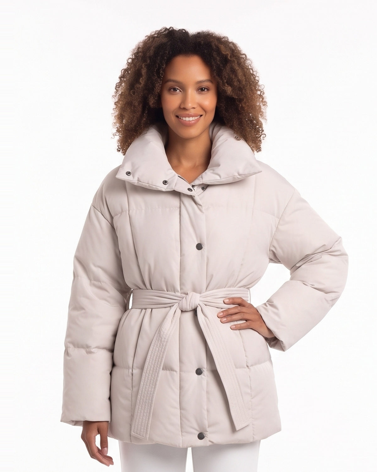 Women’s belted puffer coat in light beige matte nylon with button front and tie belt