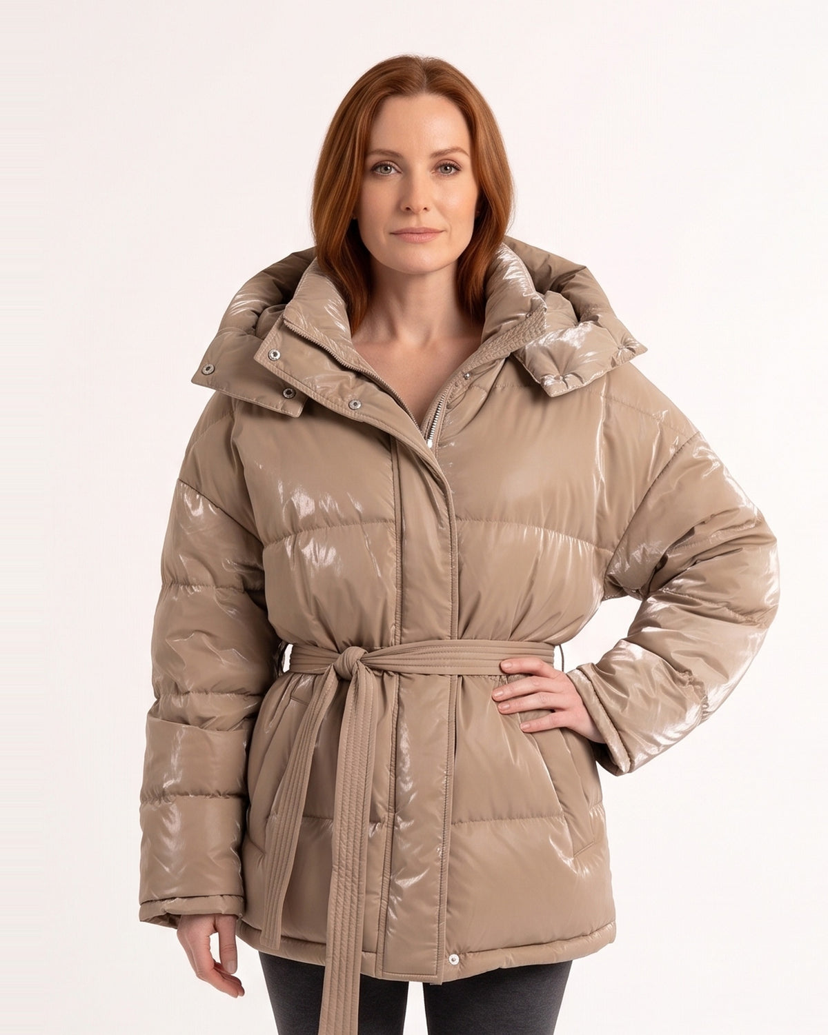 Women’s belted puffer jacket in glossy khaki with oversized hood and tie waist