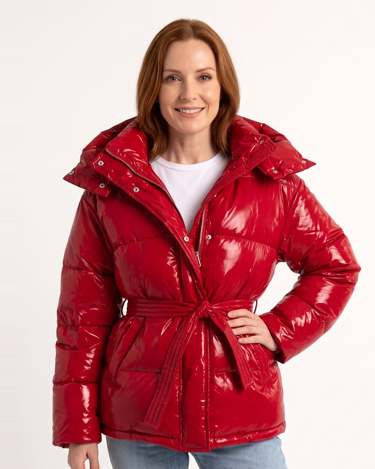 Women’s belted puffer jacket in glossy red with oversized hood and tie waist