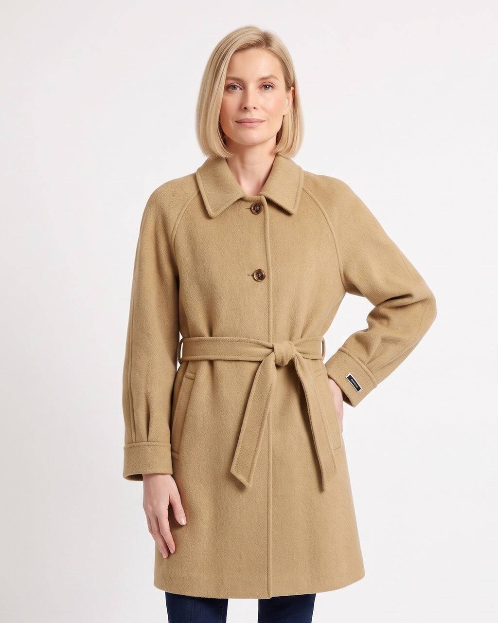 Camel wool coat with a notched collar, button front, raglan sleeves and tied belt