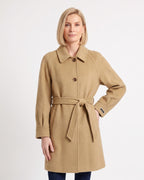 Camel wool coat with a notched collar, button front, raglan sleeves and tied belt